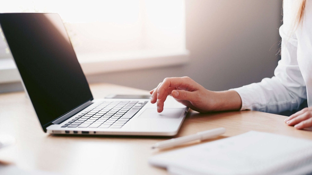 business woman working on laptop in her office free photo 2210x1473 1